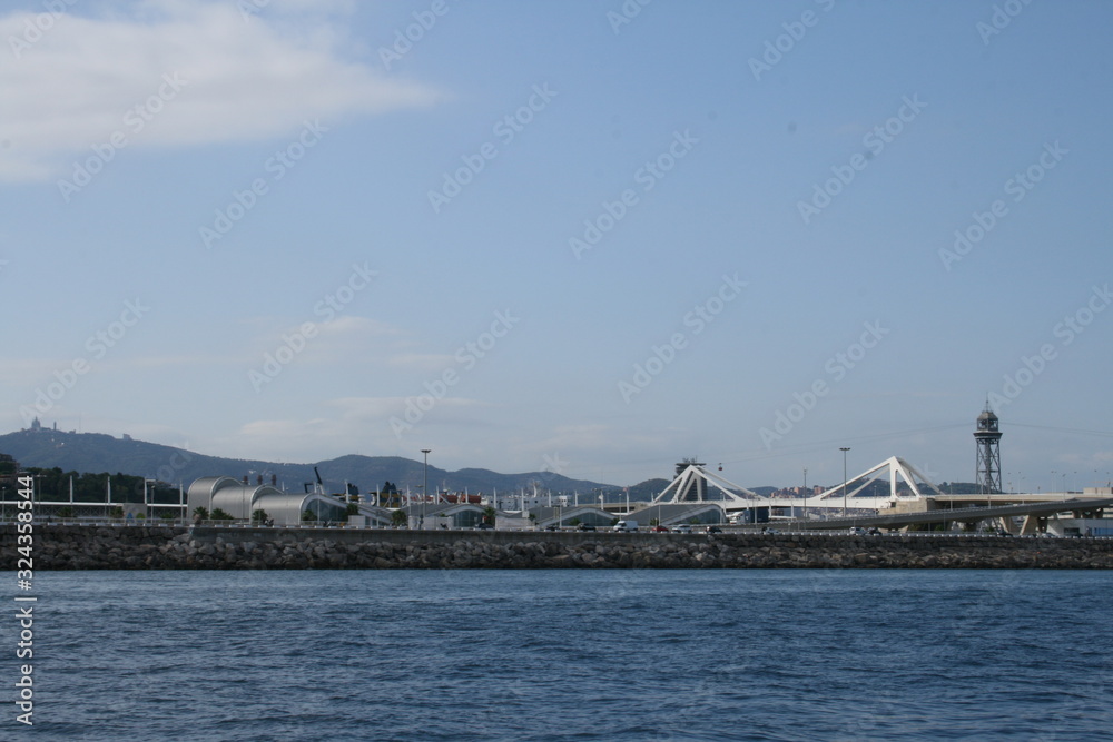 VIEW OF THE PORT OF BARCELONA AND SURROUNDINGS FROM A FERRY