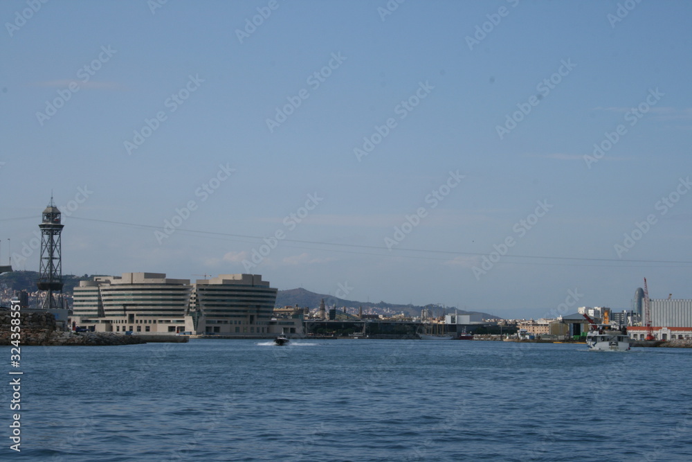 VIEW OF THE PORT OF BARCELONA AND SURROUNDINGS FROM A FERRY