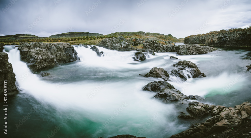 Dark and calm long exposure of glannifoss in Iceland