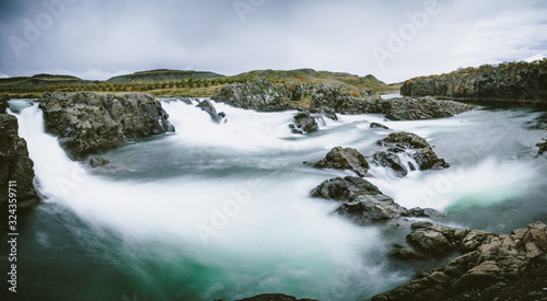 Dark and calm long exposure of glannifoss in Iceland