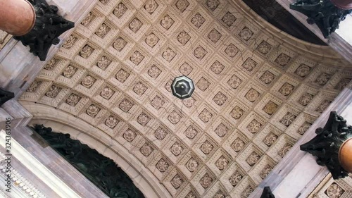 Bottom view of a beautiful ceiling of the Cathedral with columns. Concept. Amazing architecture of the historic building. photo