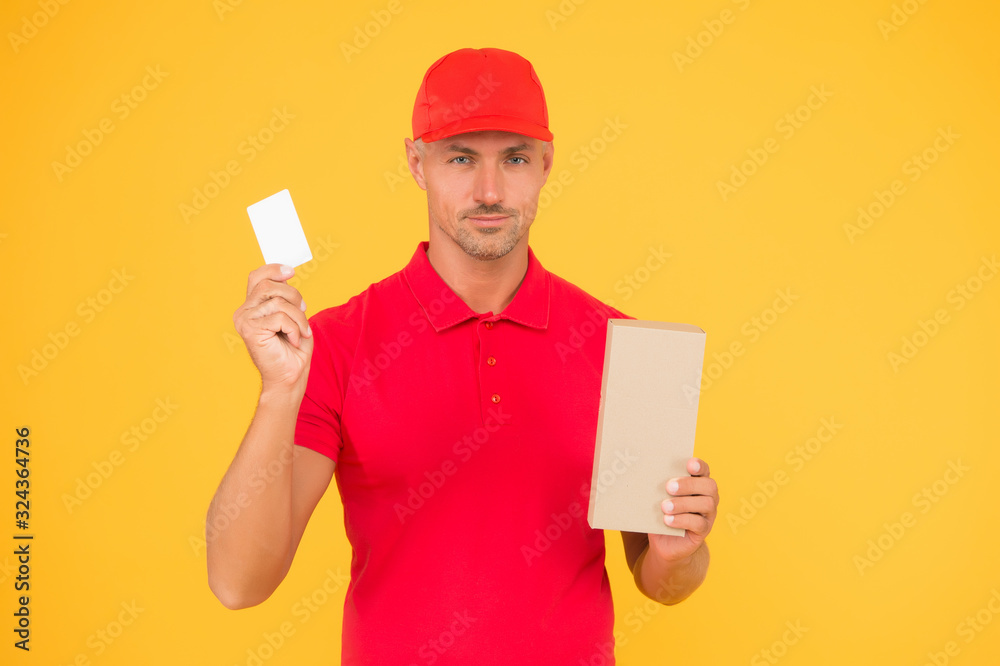 Big sale and discount. Delivery man hold discount card and box. Parcel service. Shopping with price discount. Special offer. Order in discount store, copy space Big sale and discount. Delivery man hold discount card and box. Parcel service. Shopping with price discount. Special offer. Order in discount store, copy space