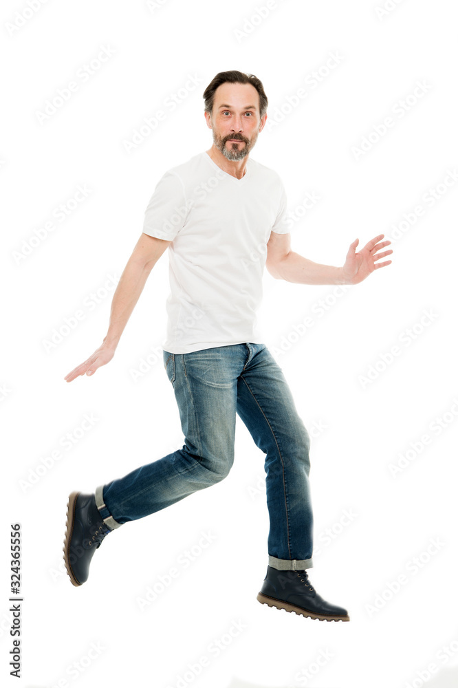 Maintaining active lifestyle. Active man jump isolated on white. Middle age adult. Mature person in casual style. Healthy ageing. Active and energetic. Stay active as you get older Maintaining active lifestyle. Active man jump isolated on white. Middle age adult. Mature person in casual style. Healthy ageing. Active and energetic. Stay active as you get older