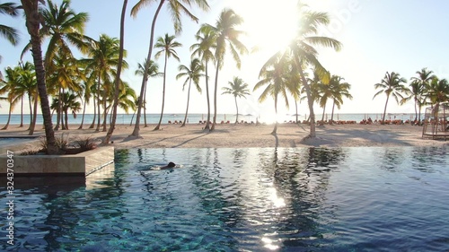 Paradise dream in tropical resort  infinity pool and luxury beach resort in Caribbean sea