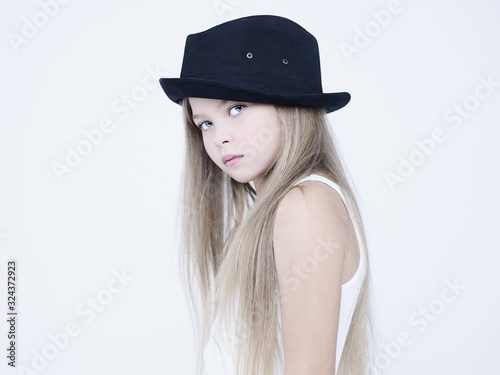little pretty girl in black hat © Egor Mayer