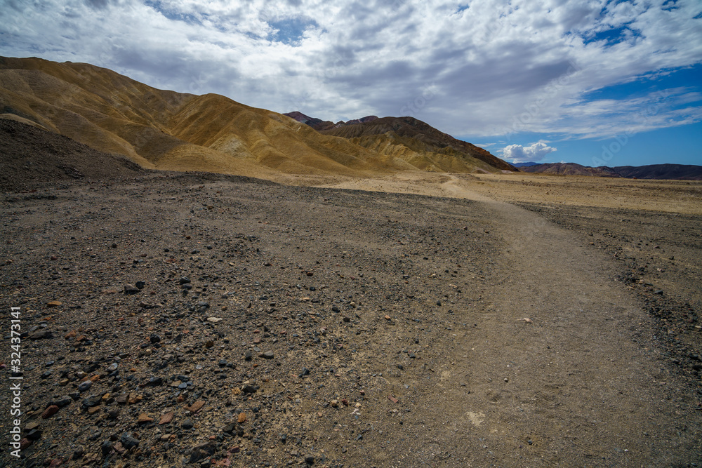 hikink the golden canyon - gower gulch circuit in death valley, california, usa