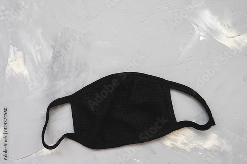 Unisex reusable black cotton mouth mask washable. Dust, smog and pollen protection photo