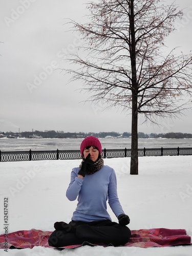 Yoga and pranayama in the snow photo