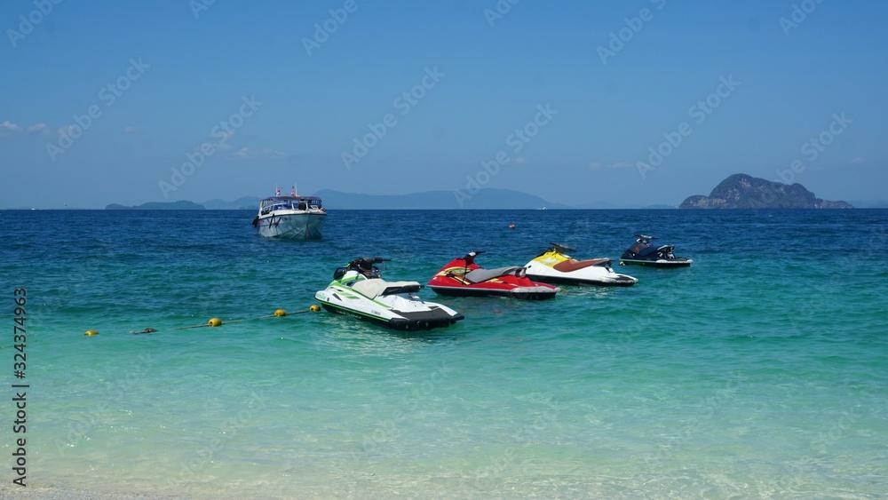 Fototapeta premium colourful jet skis in the ocean