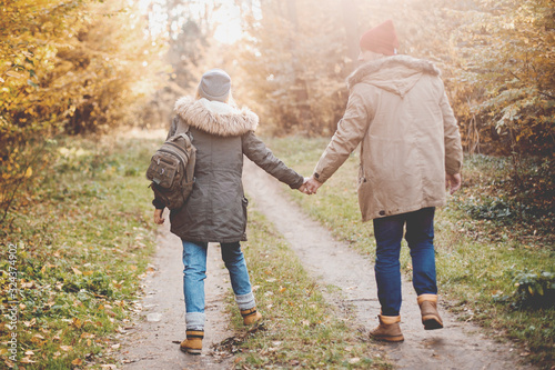 Traveler couple in love enjoying in the forest. Freedom and active lifestyle concept.