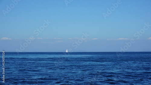 sailing ship far in the distance