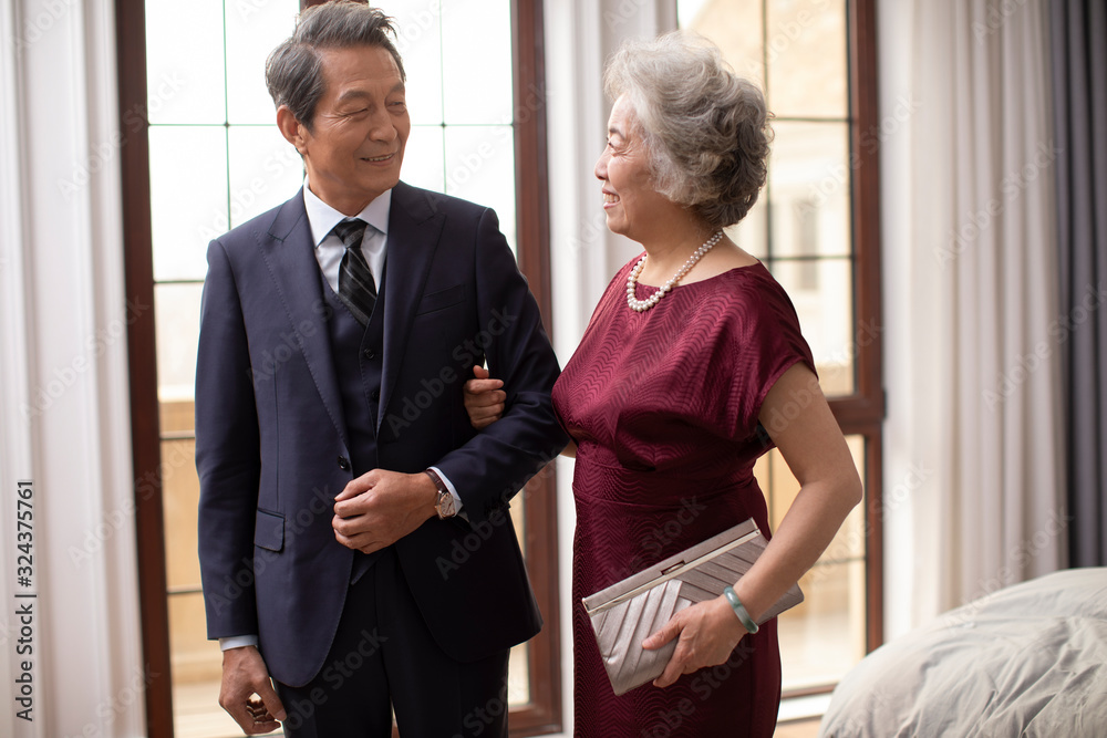 Loving senior Chinese couple at home Loving senior Chinese couple at home