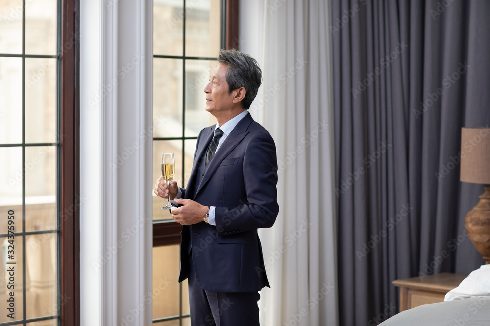 custom made wallpaper toronto digitalSenior Chinese man drinking champagne at home