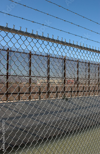 US Border Fence ,irrigation canal,barbed wire