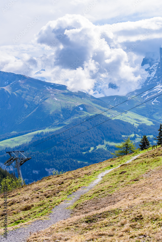 Crossing the Alps. Hiking trail in the Alps. Murren. Switzerland. Crossing the Alps. Hiking trail in the Alps. Murren. Switzerland.