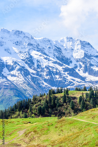 Crossing the Alps. Hiking trail in the Alps.