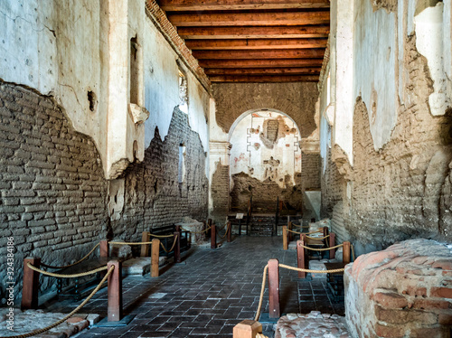 The landmark, mauve, adobe church at Tumacacori National Historical Park, Arizona photo