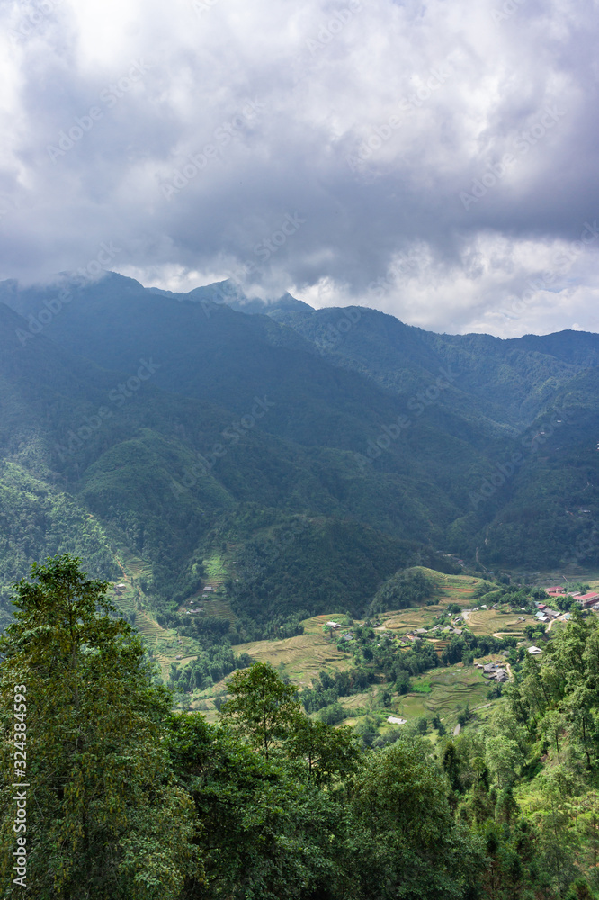 Beautiful scenery, popular tourist trekking destination. Rice field terraces.  Mountain view in the clouds. View from the funicular Sapa, Lao Cai Province, north-west Vietnam.