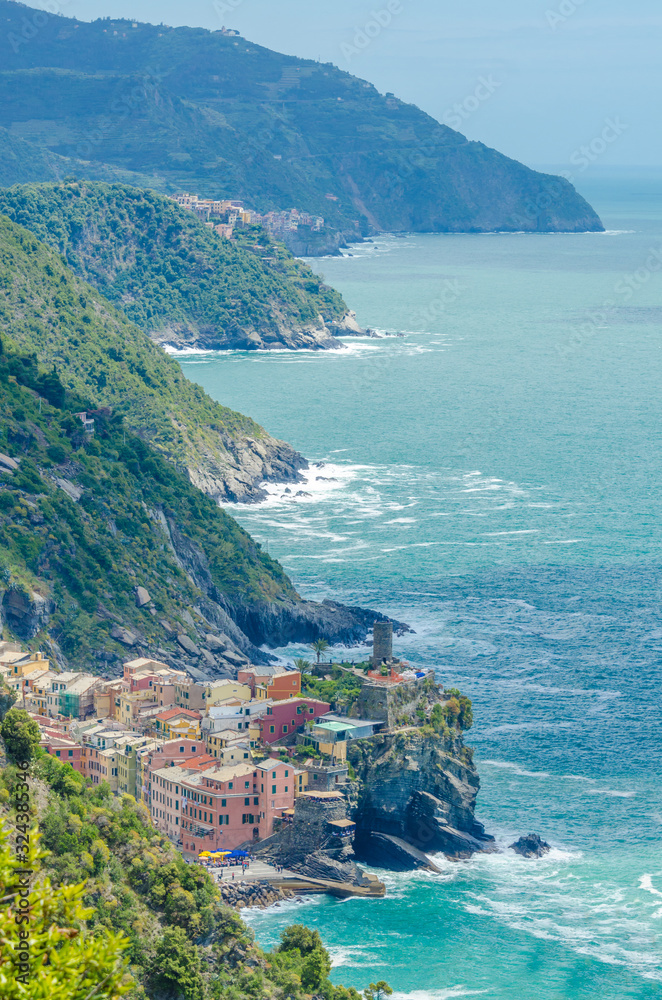 Naklejka premium Vernazza in Cinque Terre, Italy, view at the town from mountain trail