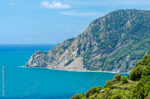 Majestic mountain ocean view from famous trail between Monterosso and Vernazza, Italy. © karamysh