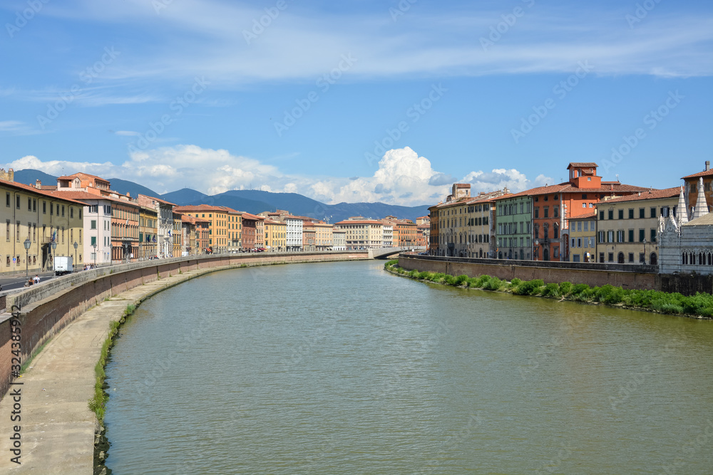 The river Arno going through the tuscan city Pisa