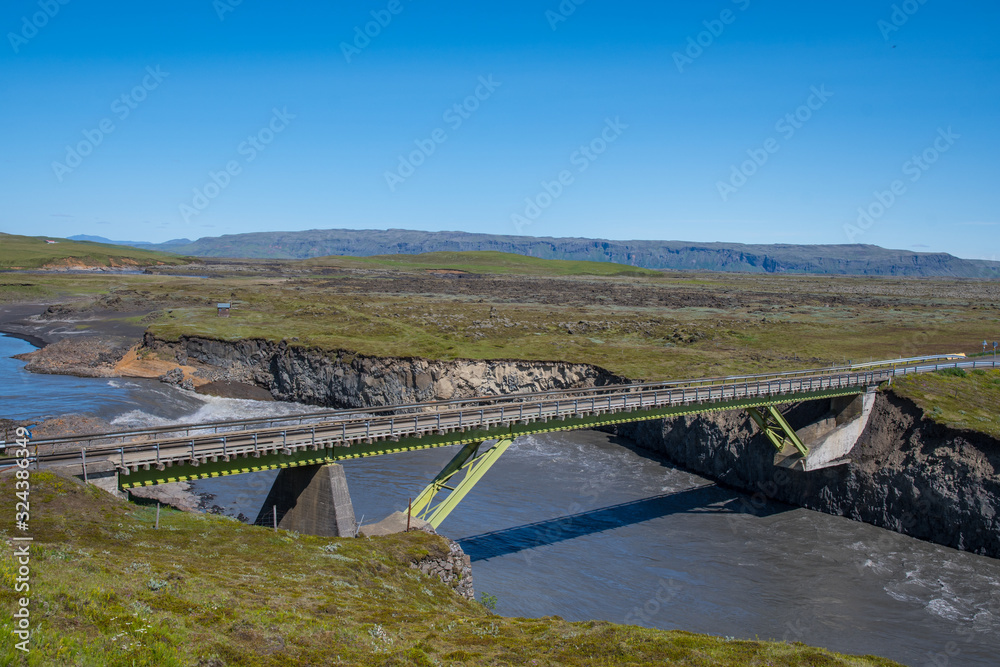 Damaged bridge crossing river Eldvotn in Iceland