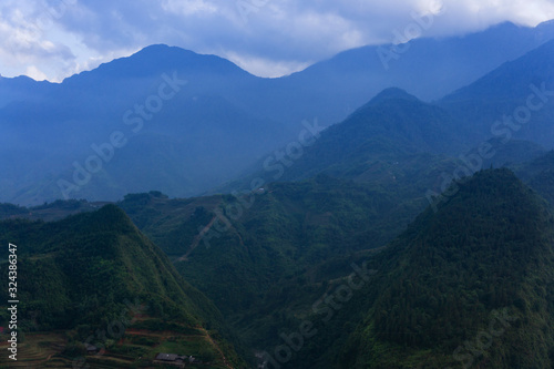 Beautiful scenery, popular tourist trekking destination. Rice field terraces. Mountain view in the clouds. Sapa, Lao Cai Province, north-west Vietnam.
