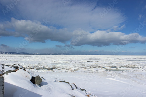 St Lawrence River in winter covered with ice in Riviere-du-Loup, Quebec