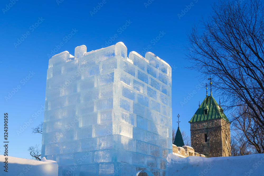 Fototapeta premium Tower build with ice cube bricks in Quebec city