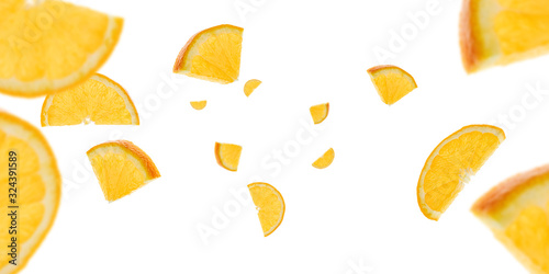 Orange fruit pattern. Tangerine slices falling on white. Citrus background.