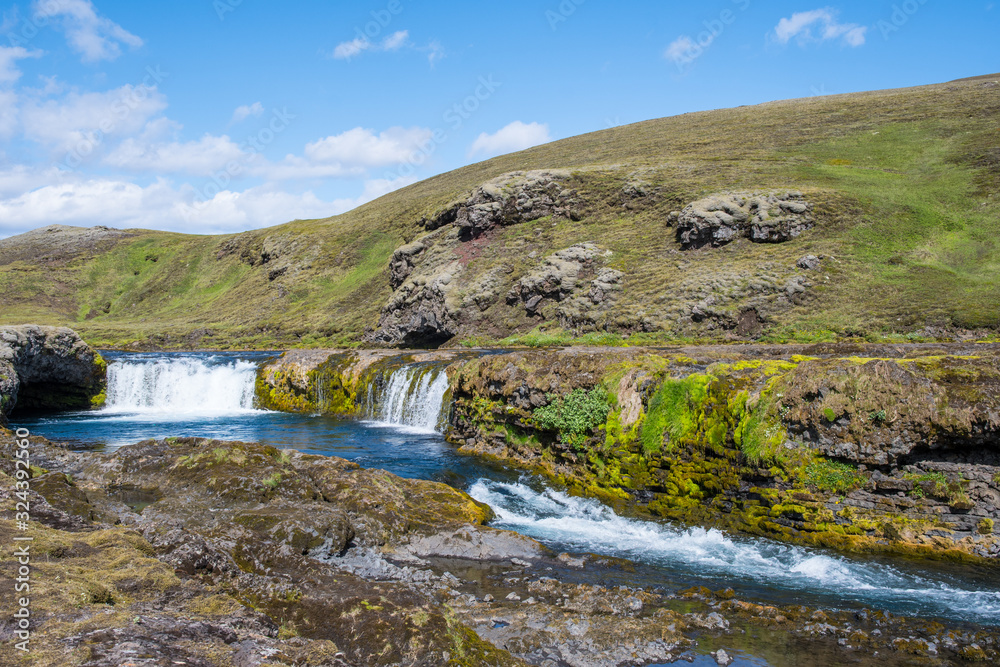 Waterfall and cascade in river Nordari Ofaera near Eldgja in Iceland Waterfall and cascade in river Nordari Ofaera near Eldgja in Iceland
