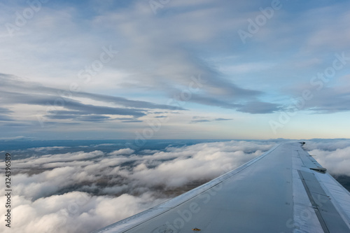 Aerial view with clouds from an airplane © Omar Molina