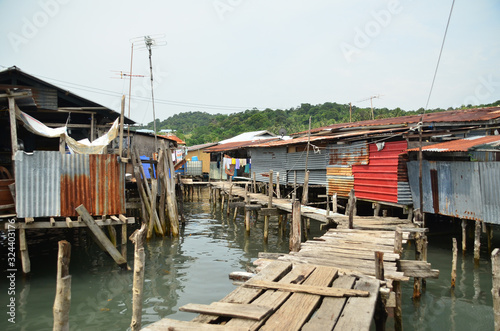 fishing, bridge, culture, bajau, plastic, debris, pollution, dirty, environment, landscape, coastline, bay, scenic, floating village, asia, attraction, beautiful, boat, borneo, building, city, destina © peacefoo