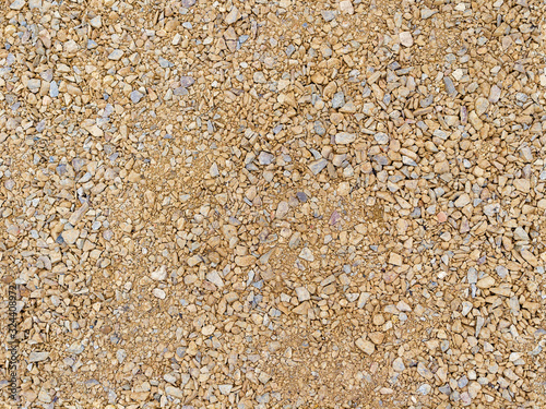 Seamless texture beige gravel. Ground surface road work. Landscape design