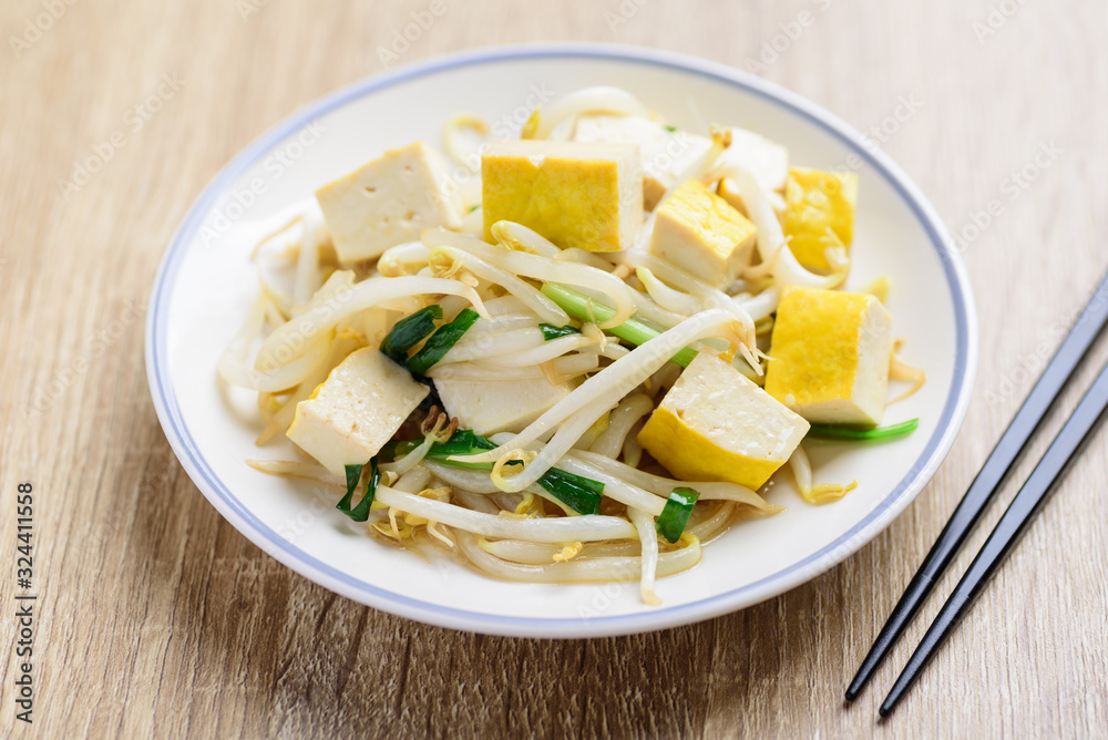 Stir fried mung bean sprouts with tofu, Asian vegan food Stir fried mung bean sprouts with tofu, Asian vegan food