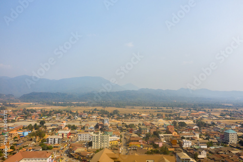 Fototapeta Naklejka Na Ścianę i Meble -  Aerial view of Vang Vieng, the adventure tourist destination in Laos