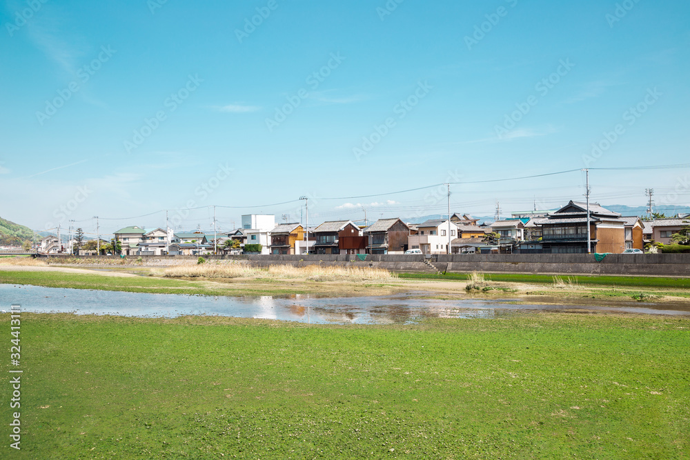 Kanonji countryside village with Saita river in Kagawa, Japan Kanonji countryside village with Saita river in Kagawa, Japan