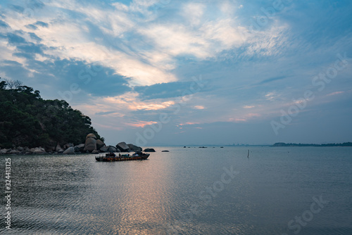 Sunset blues hour shantou city coastal scenery photo