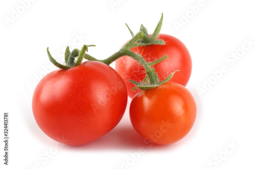 Red cherry tomatoes isolated on white