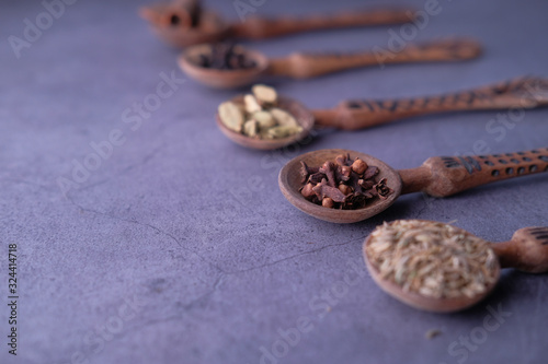 Close up of cooking ingredient and herbs on spoon 