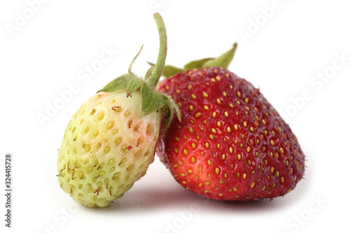 Ripe and unripe strawberries