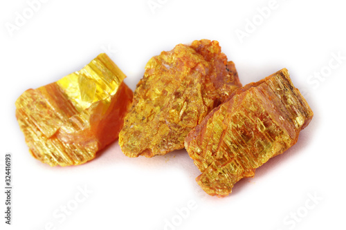 Auripigment (orpiment, arsenic mineral) isolated on white