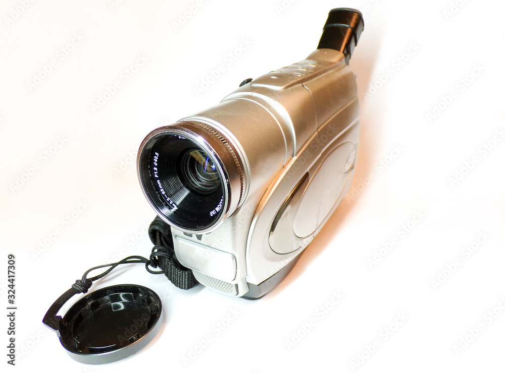 The video camera is isolated on a white background. Analog video camera for family shooting. Old video cameras and cameras. The video camera is isolated on a white background. Analog video camera for family shooting. Old video cameras and cameras.