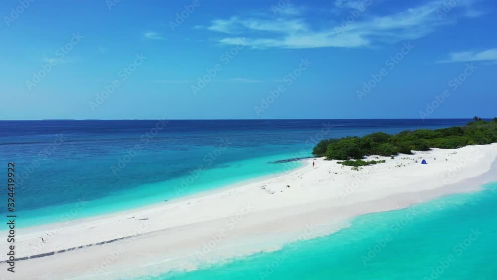 aerial,distant view of Tropical Island, sandbank, in crystal clear water. aerial,distant view of Tropical Island, sandbank, in crystal clear water.