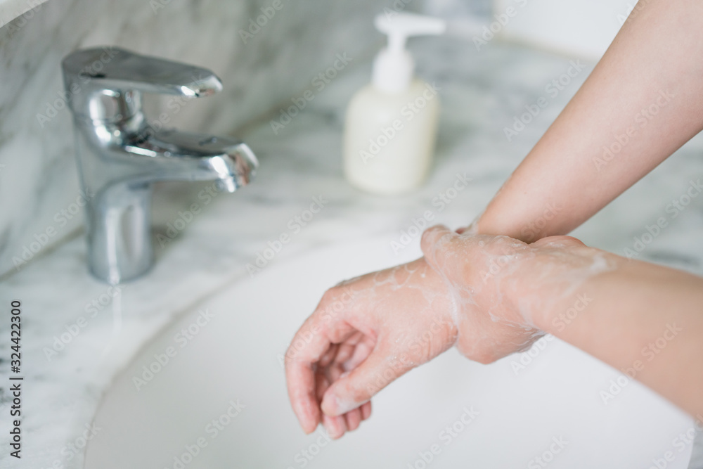 Hand features of Asian women washing their hands Hand features of Asian women washing their hands