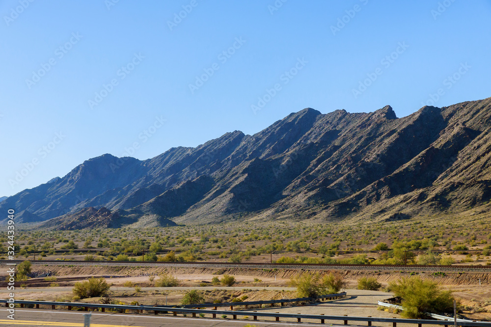 Mountains along desert and blue sky in the landscape of Arizona, USA