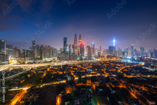 Canvas Print Kuala Lumpur city skyscraper and street with nice sky twilight at downtown business district in Kuala Lumpur