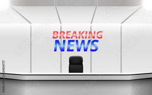 white table and chair in the news studio room