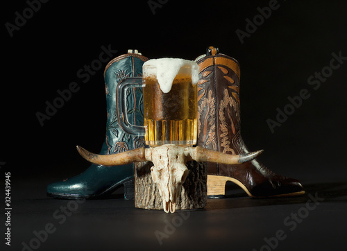 Green and Brown Cowboy Boots, Mug of Beer and Longhorn Skull on
