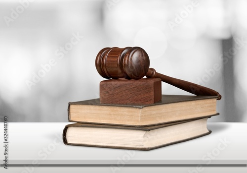 Lawyer books and wooden gavel. Justice concept